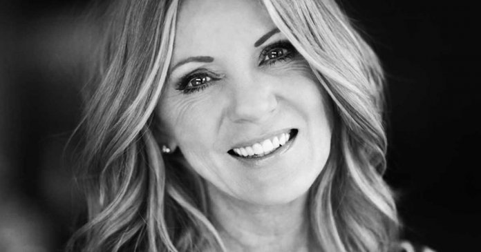 Mature Woman smiling at the camera