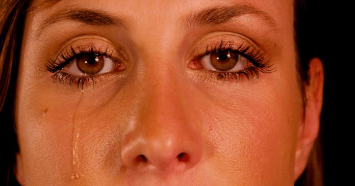 close-up-slow-motion-tears-coming-out-of-eyes-and-running-down-the-cheeks_4jvoyakq__F0000