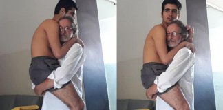 Foto com avô segurando neto autista de 17 anos no colo viraliza