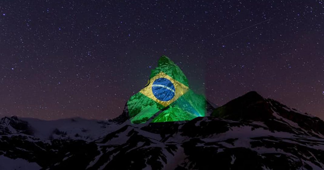 Na Suiça, bandeira do Brasil é projetada em montanha para emanar força aos brasileiros